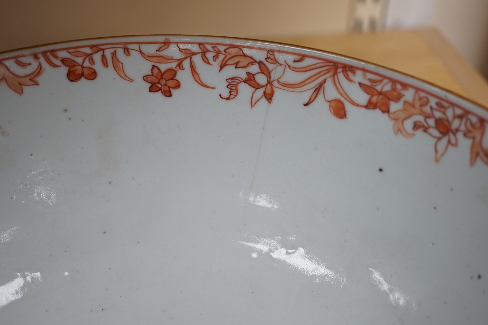 An 18th century Chinese gilt decorated powder blue glazed bowl, 26cm diameter